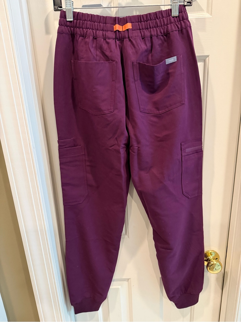 FIGS Women's Jogger Scrub Pants in Plum with Orange Drawstring - Picture 2 of 7